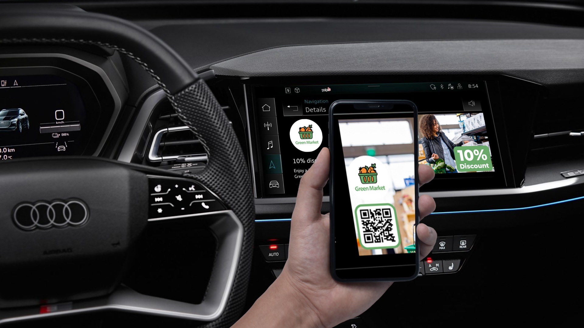 Smartphone scant de QR-code van een aanbieding in Audi MMI.